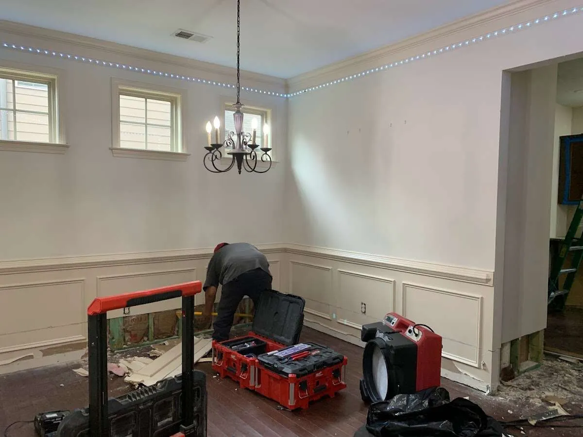 Restoration technician with professional equipment in Frederick